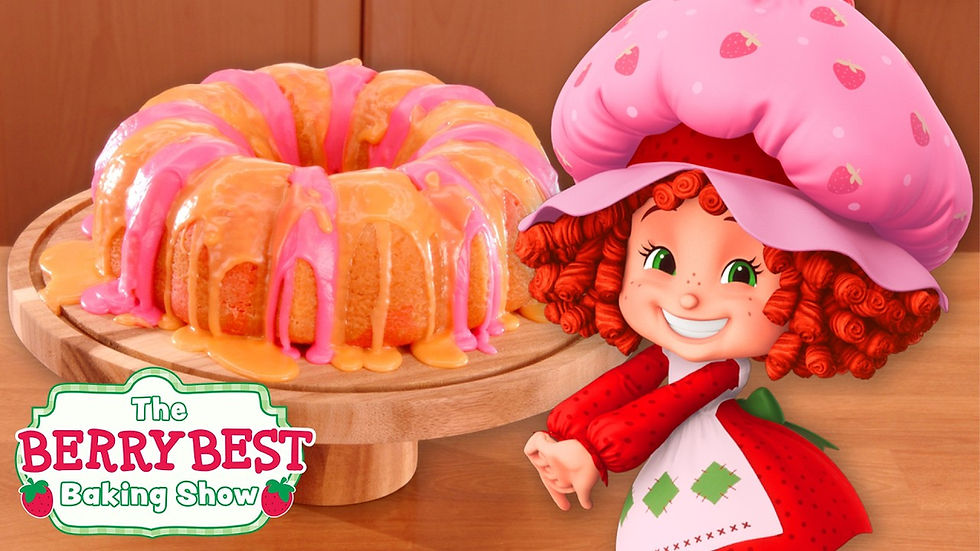 A girl with red hair and a pink hat beside colourful cake.