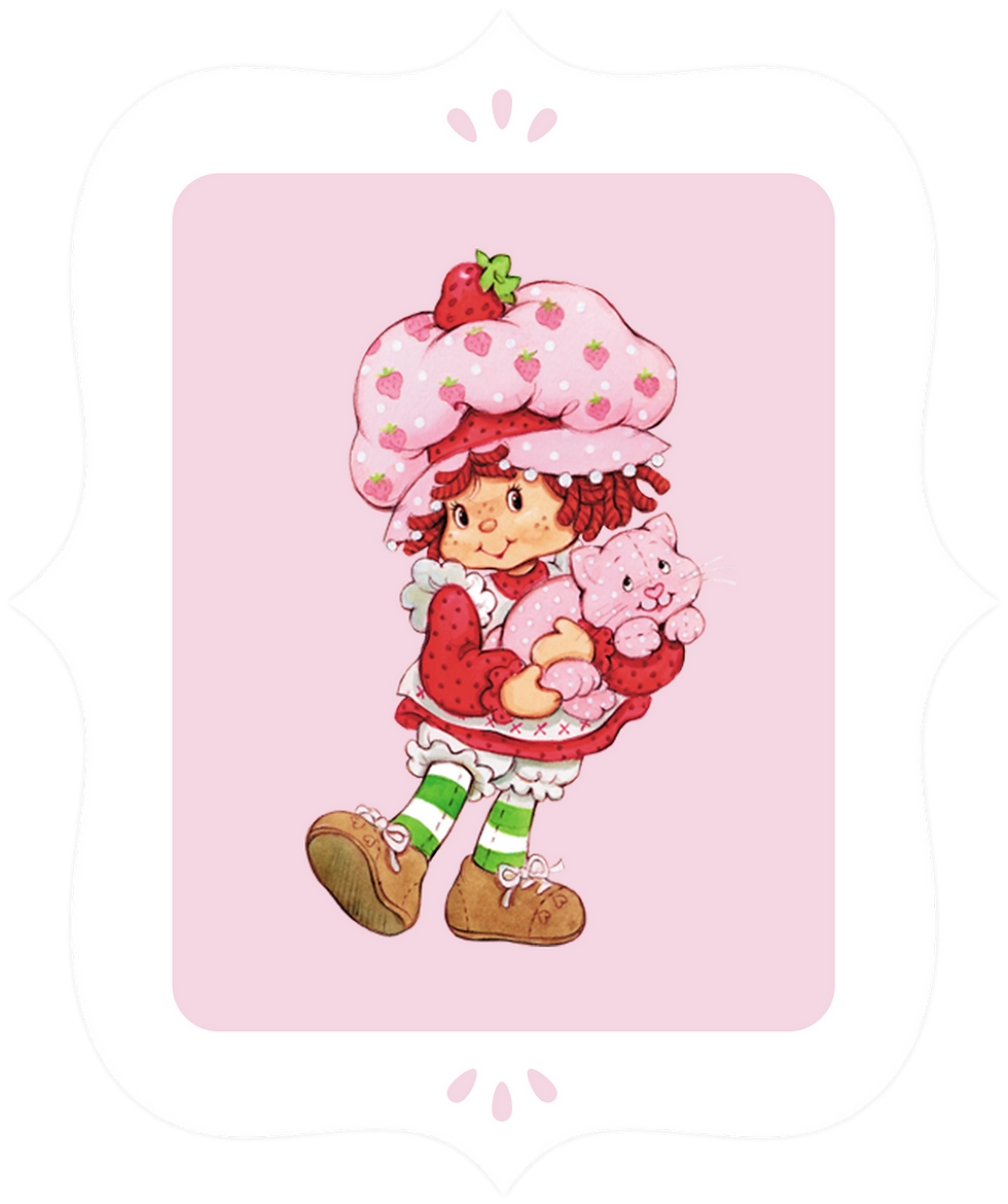 A girl wearing a pink dress with a large, pink strawberry hat and holding a pink cat in her arms.